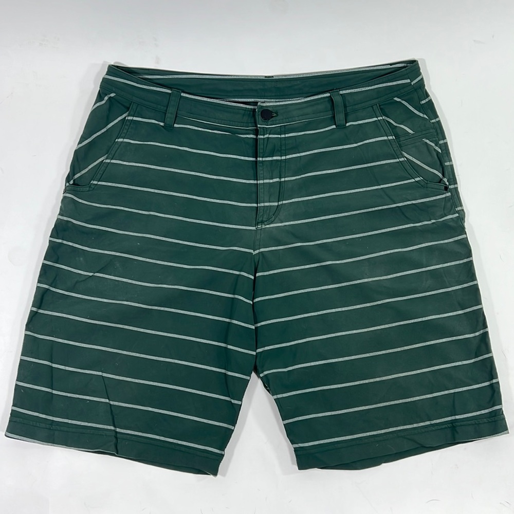 Men’s Lululemon five pocket green and white striped shorts. Waist size 34.